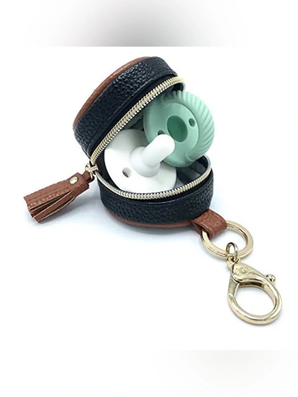 Itzy Ritzy Round Diaper Bag pod in Black, White & Brown